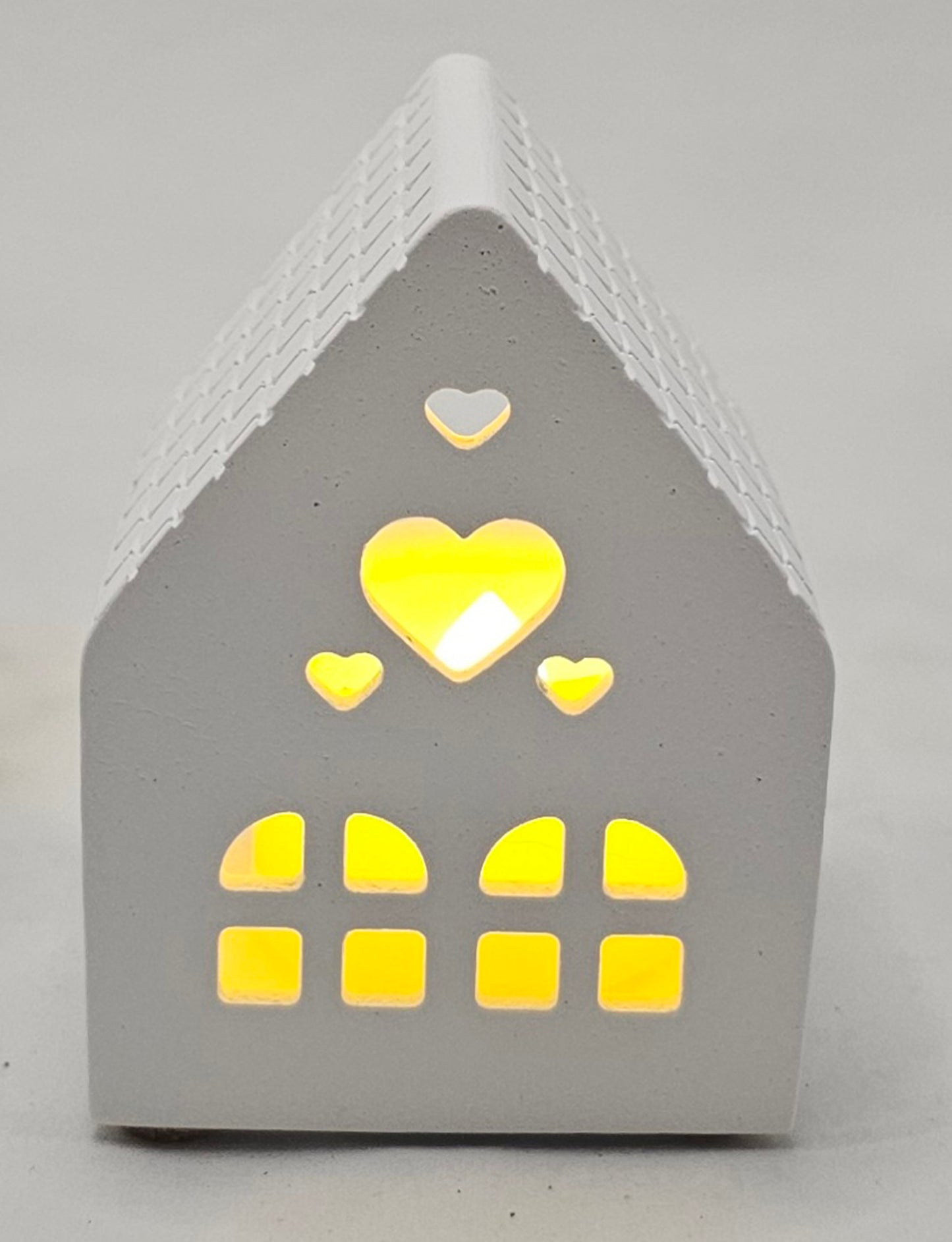 Lichthaus klein, aus Raysin gegossen, incl. LED Teelicht.