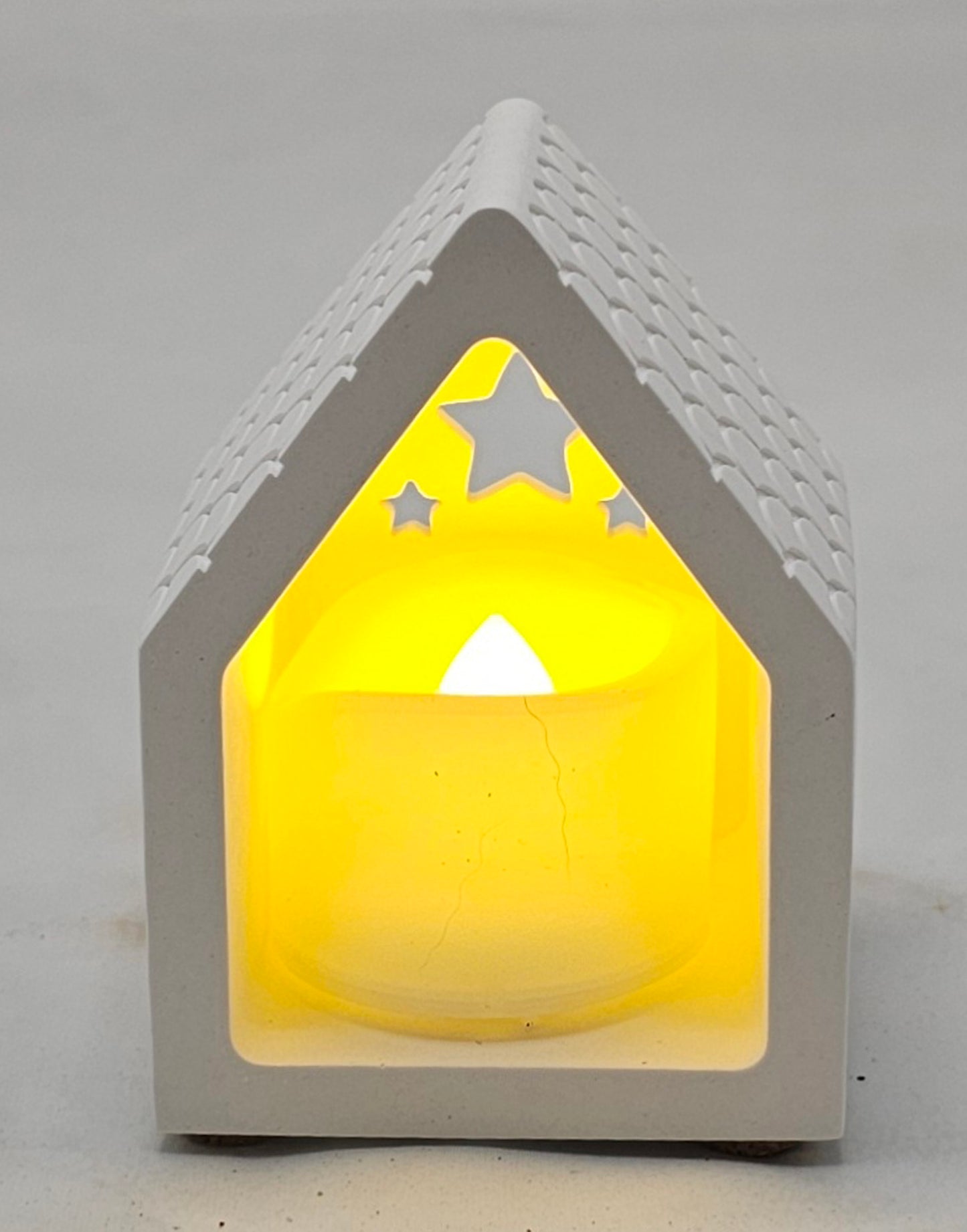 Lichthaus klein, aus Raysin gegossen, incl. LED Teelicht.